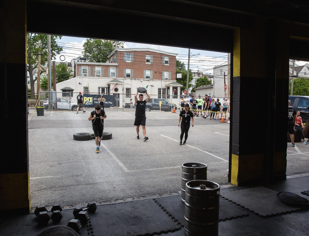Outdoor fitness event at PIT: participants engaged in high-intensity group exercises
