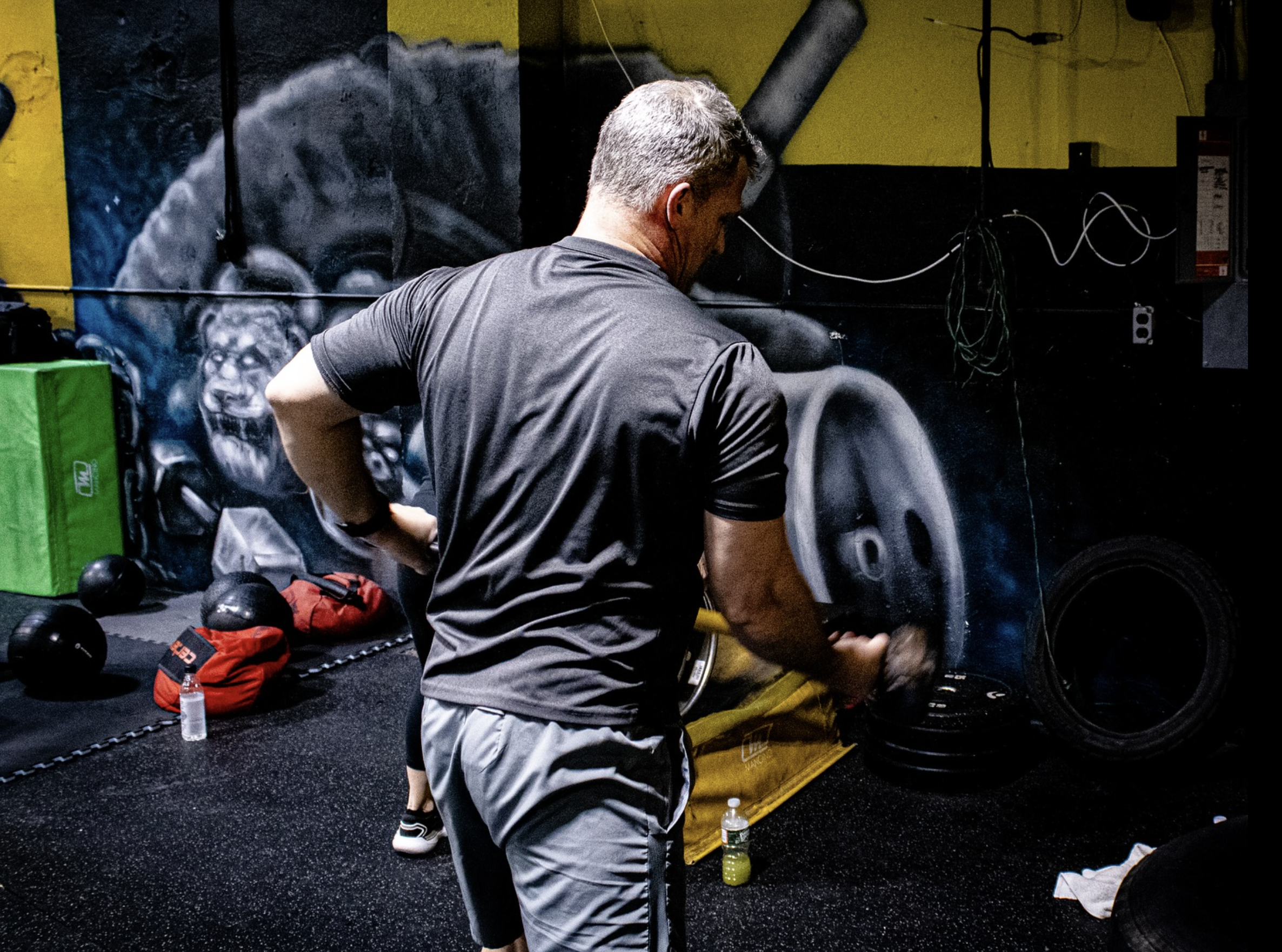 A-fitness-enthusiast-exploring-different-gym-workout-zones-at-PIT-to-match-training-goals-2