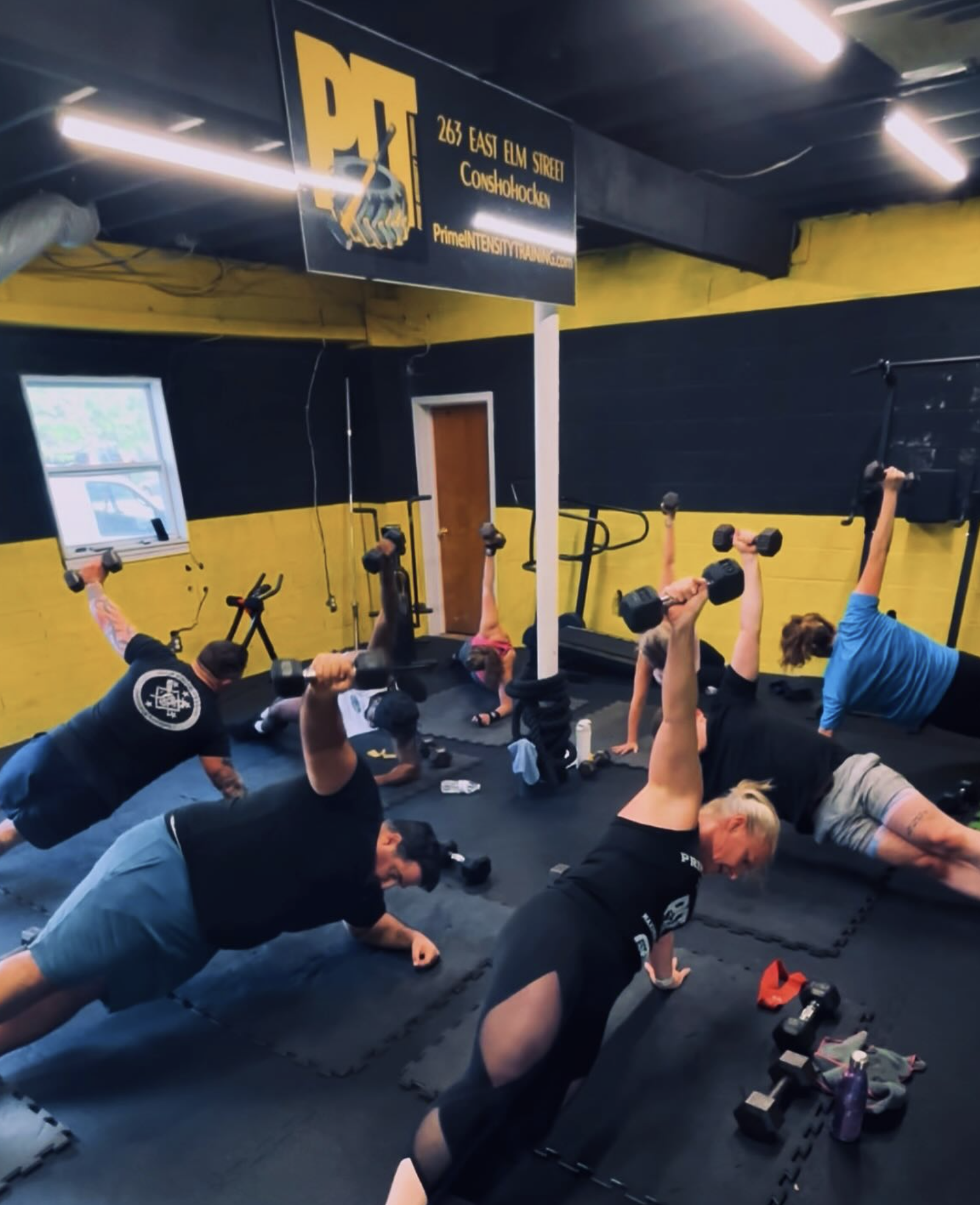 Athletes performing outdoor HIIT exercises like sprinting, burpees, and jump squats in sunny weather, representing dynamic summer fitness